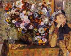 A Woman Seated Beside A Vase Of Flowers