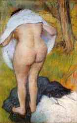 Nude Woman Pulling On Her Clothes
