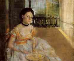 Woman Seated On A Balcony
