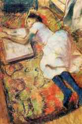 Young Girl Reading On The Floor