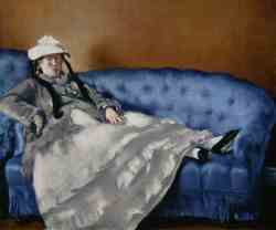 Portrait Of The Woman On A Blue Sofa