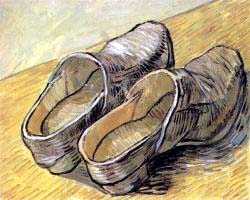 A Pair Of Leather Clogs