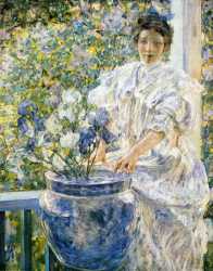 Woman On A Porch With Flowers